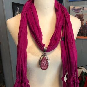 Hot pink scarf with oval pink medallion. Excellent condition.